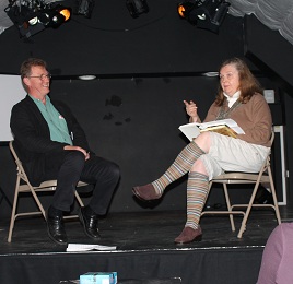 Steve Rowley in conversation with Claudia Chapman of the Hat City Mummers, Danbury, Connecticut, USA at the Symposium of the International Mummers Unconvention, Bath, 2011